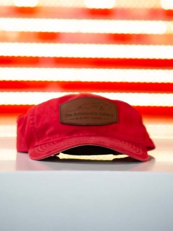 Red baseball hat with leather Automobile Gallery logo